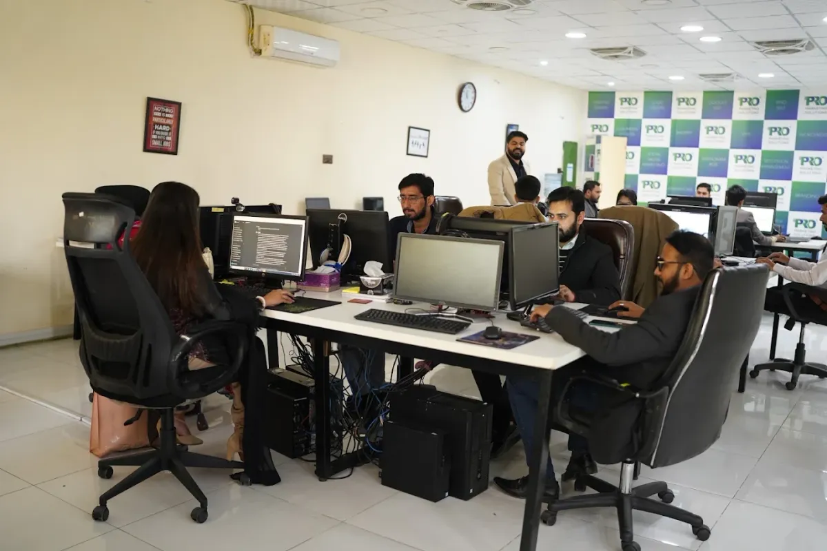 WeProms colleagues at work in the Lahore office